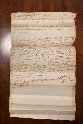 Item #2431 A legal dispute filed in Frederick County, Maryland regarding the slave Ben. The text...